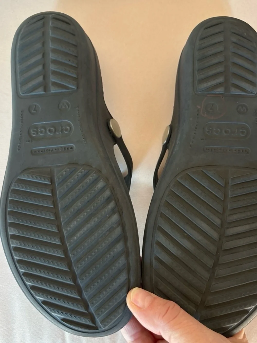 CROCS Womens Black Thong Sandals with Silver Oval Accent
